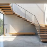 découvrez comment l'escalier suspendu optimise l'espace visuel et apporte une touche moderne et aérienne aux entrées contemporaines.